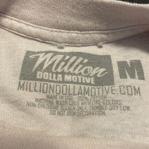 king white T-shirt, a medium in men, and the condition is good texture